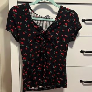 rue 21, black with cherries tee, size L but can fit a medium